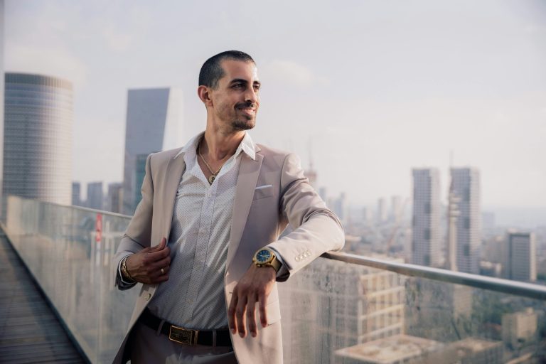 businessman looking out over the city