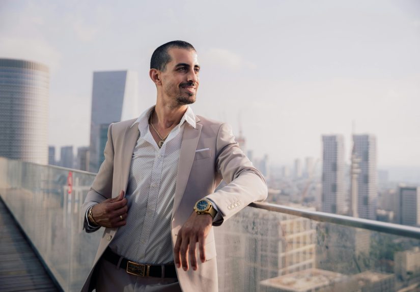 businessman looking out over the city