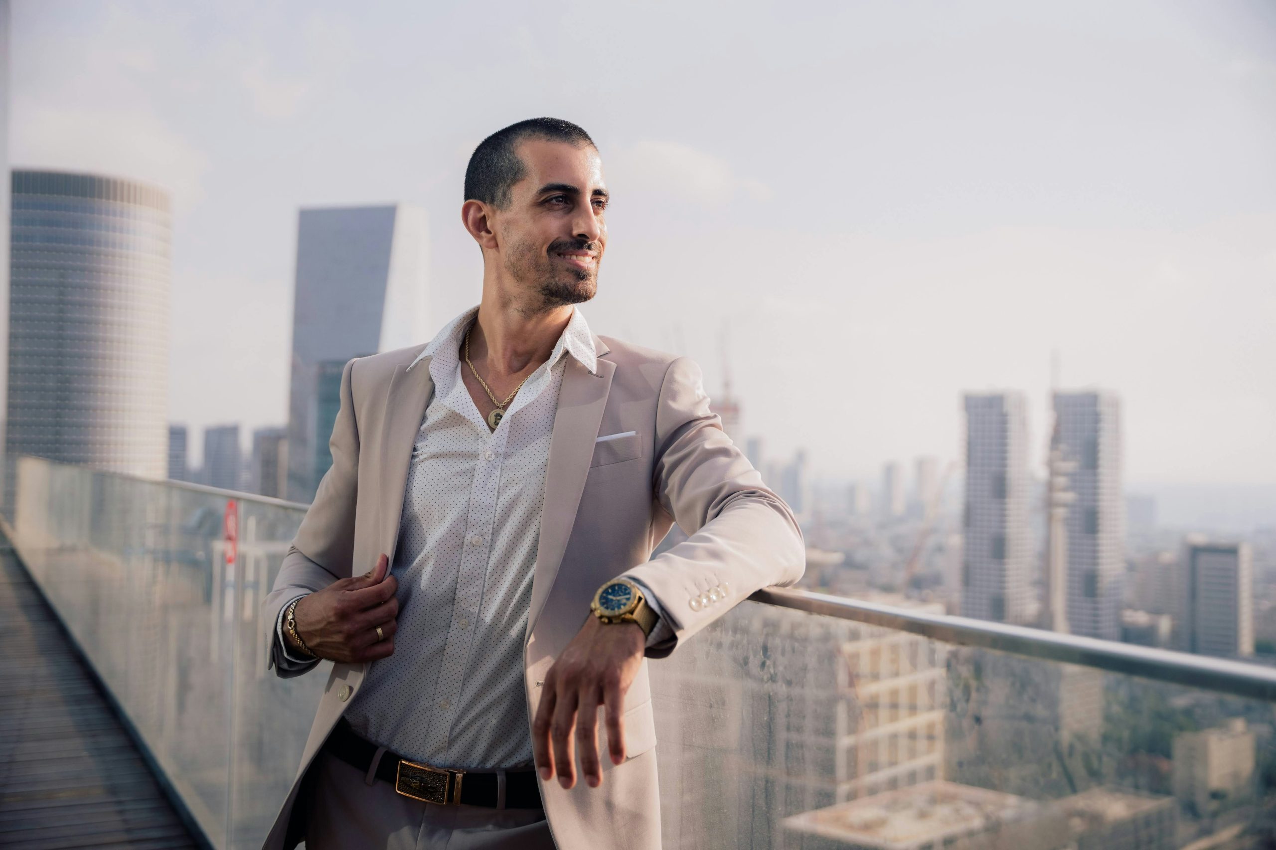 businessman looking out over the city